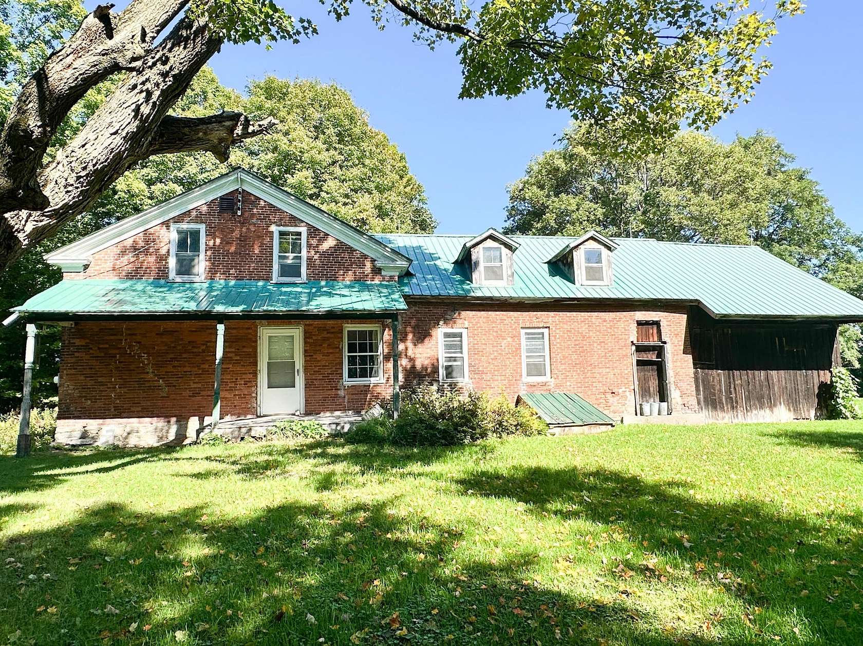 10.9 Acres of Land with Home for Sale in Plattsburgh, New York