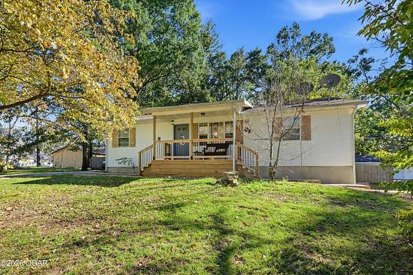 2.32 Acres of Land with Home for Sale in Carthage, Missouri