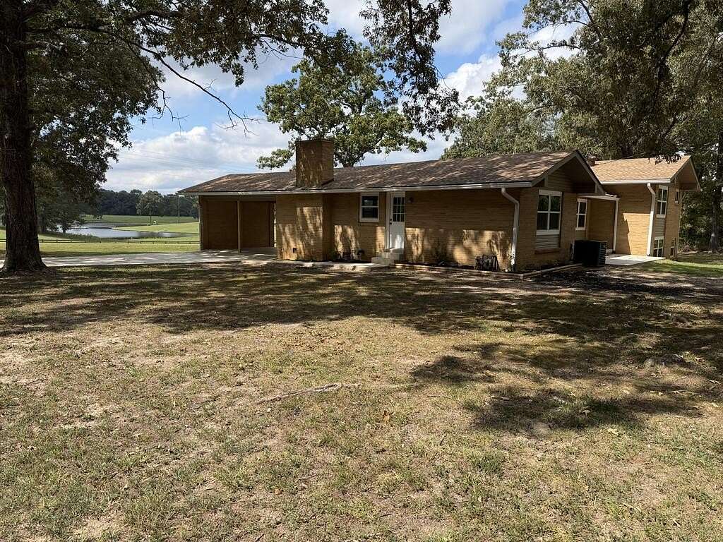 1.7 Acres of Land with Home for Sale in Camden, Tennessee