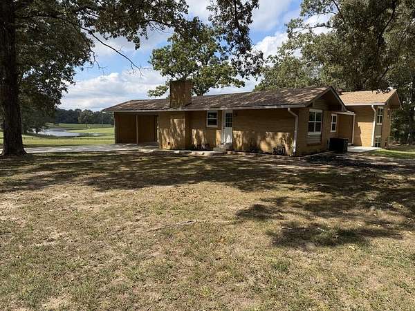 1.7 Acres of Land with Home for Sale in Camden, Tennessee