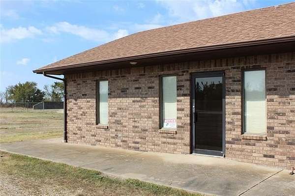 9.8 Acres of Improved Commercial Land for Sale in Checotah, Oklahoma