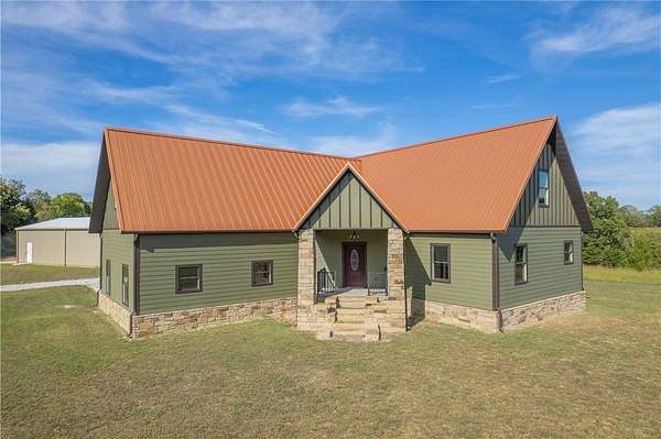 5 Acres of Land with Home for Sale in Goodman, Missouri