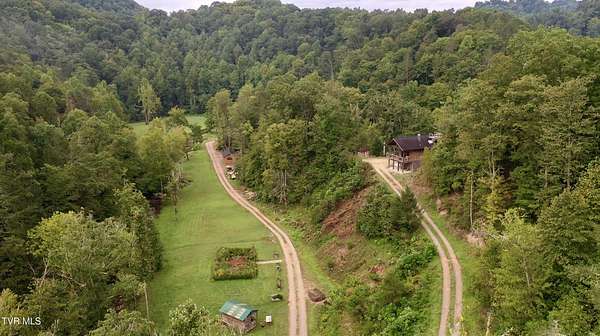 565 Acres of Land with Home for Sale in Surgoinsville, Tennessee