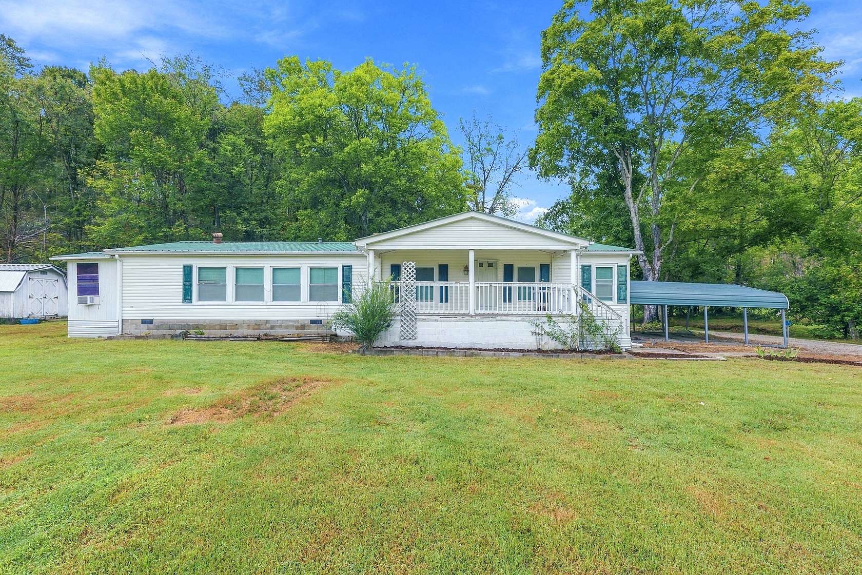 10 Acres of Land with Home for Sale in Pleasantville, Tennessee