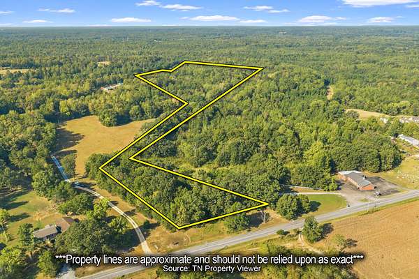 55 Acres of Recreational & Residential Land for Sale in Scotts Hill, Tennessee