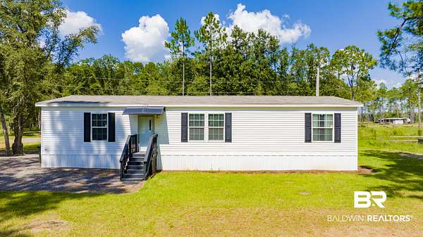1.87 Acres of Land with Home for Sale in Elberta, Alabama