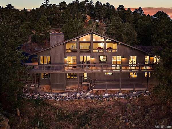 4.5 Acres of Land with Home for Sale in Evergreen, Colorado