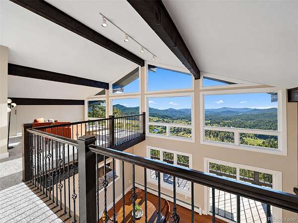 4.5 Acres of Land with Home for Sale in Evergreen, Colorado