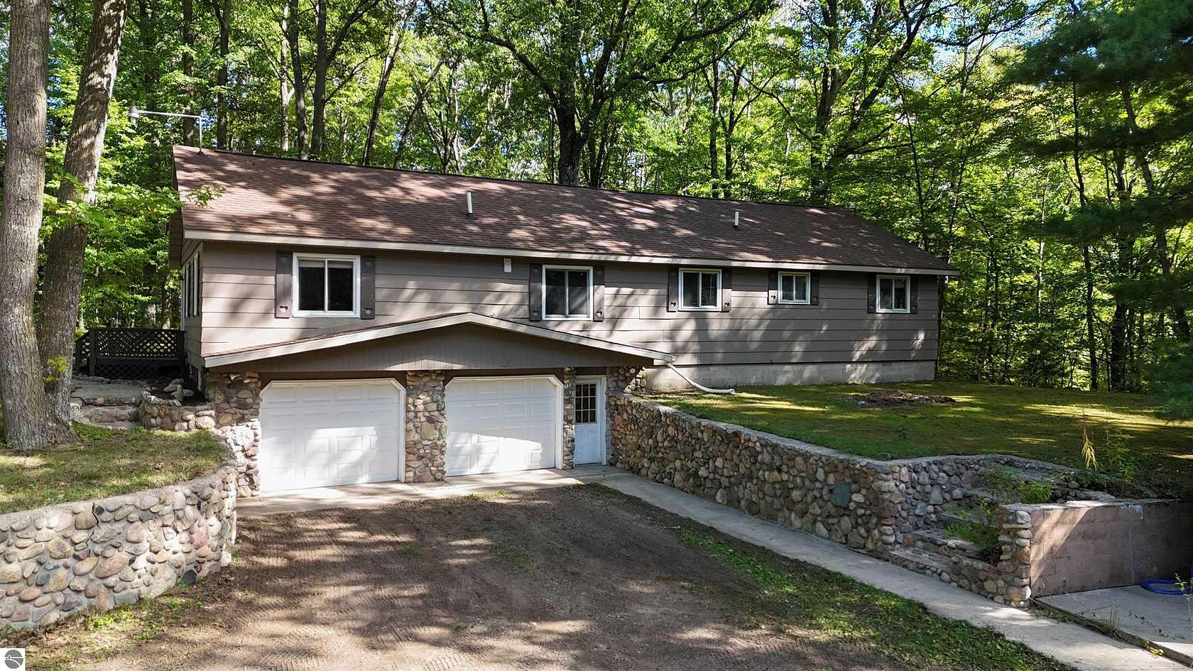 10 Acres of Recreational Land with Home for Sale in Lake City, Michigan