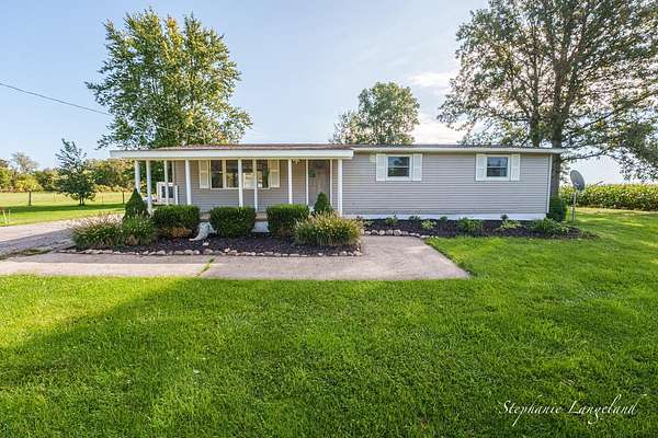 2.59 Acres of Land with Home for Sale in Coopersville, Michigan