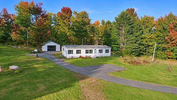9.53 Acres of Land with Home for Sale in Sebec, Maine