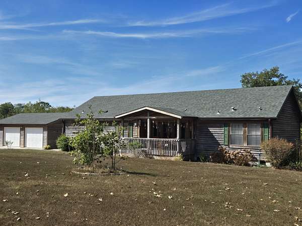 5 Acres of Land with Home for Sale in Louisburg, Missouri