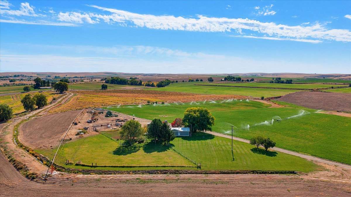 73.9 Acres of Agricultural Land with Home for Sale in Parma, Idaho