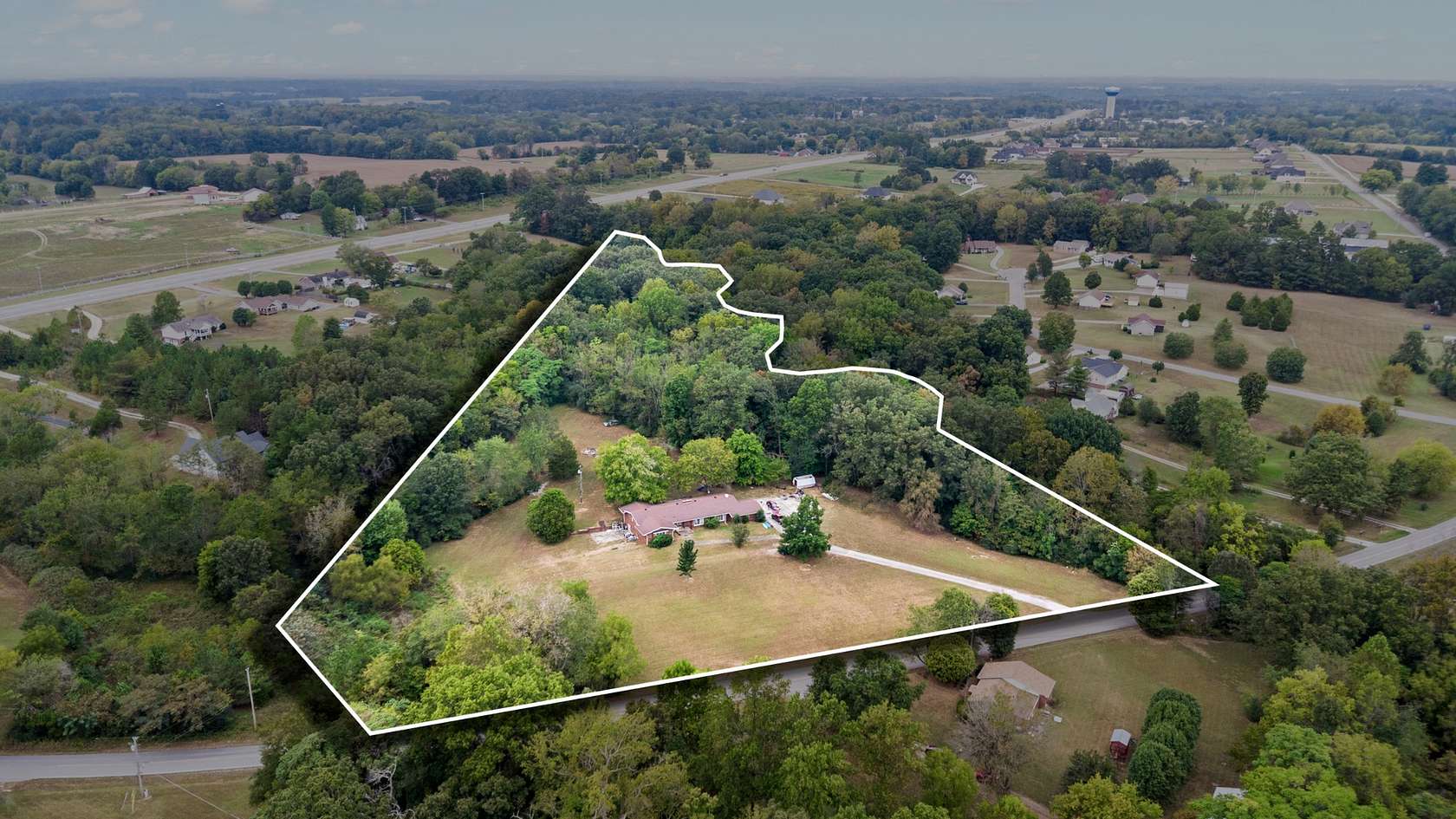 8.35 Acres of Land with Home for Auction in Greenbrier, Tennessee