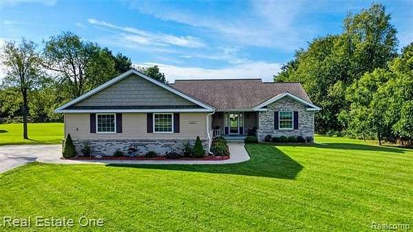 1.75 Acres of Land with Home for Sale in Springfield Township, Michigan
