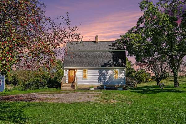 1.55 Acres of Land with Home for Sale in Sparta, Michigan