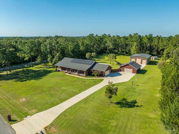 5.68 Acres of Land with Home for Sale in Molino, Florida