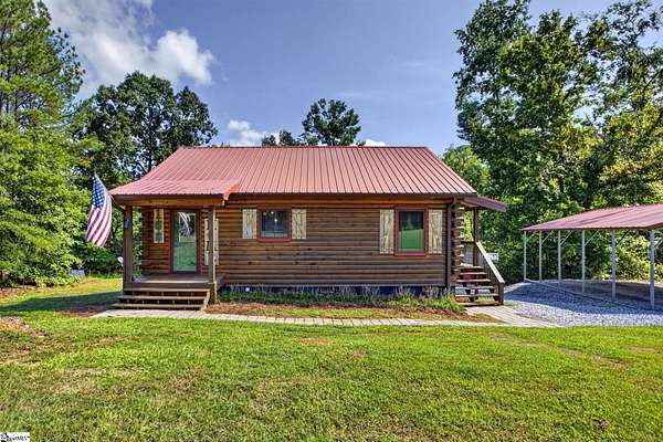 2.5 Acres of Land with Home for Sale in Cross Hill, South Carolina