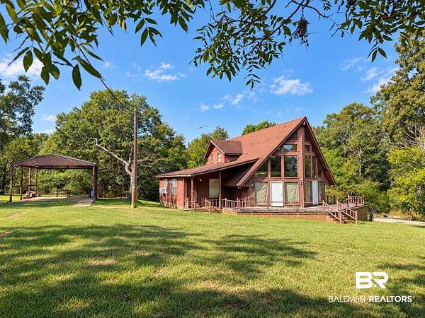 6.45 Acres of Land with Home for Sale in Frisco City, Alabama