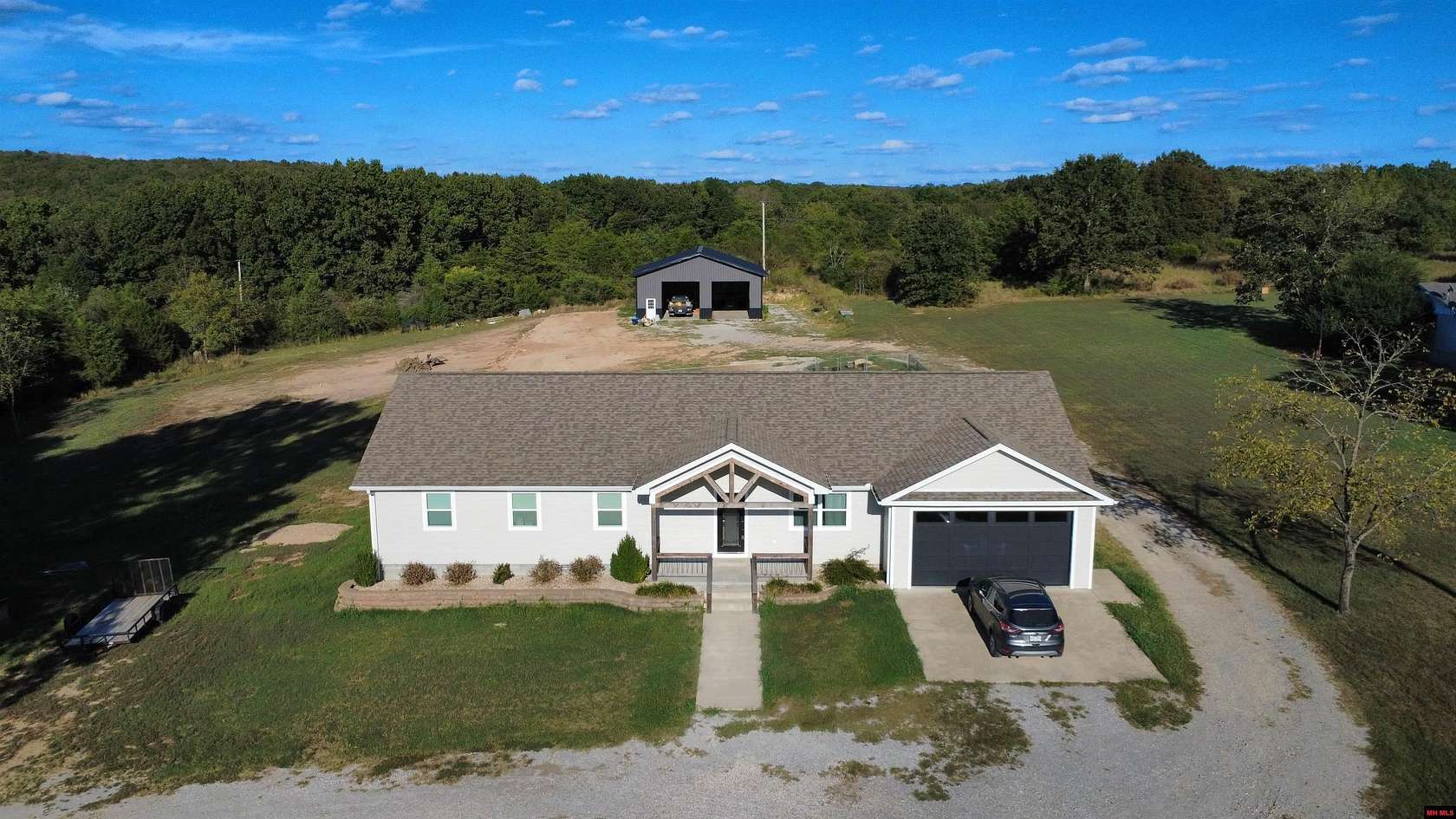 2 Acres of Land with Home for Sale in Flippin, Arkansas