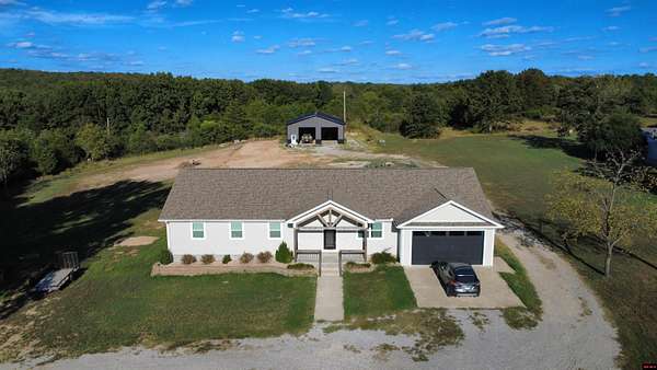 2 Acres of Land with Home for Sale in Flippin, Arkansas