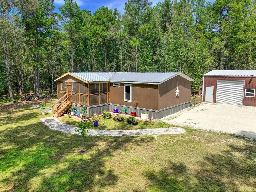 5.52 Acres of Land with Home for Sale in Grapeland, Texas