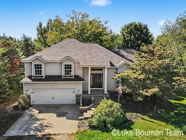 3.36 Acres of Land with Home for Sale in West Olive, Michigan