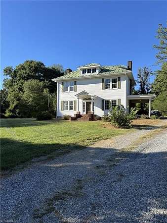 2.37 Acres of Land with Home for Sale in Walkertown, North Carolina