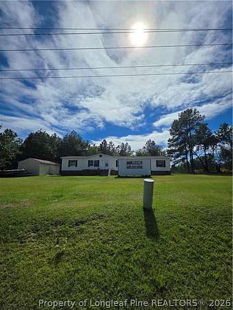 4.77 Acres of Land with Home for Sale in Bunnlevel, North Carolina