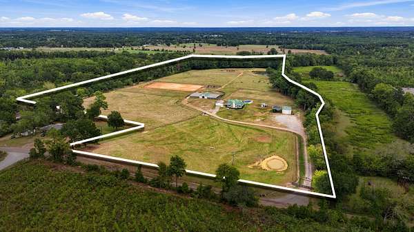 35.4 Acres of Agricultural Land with Home for Sale in Troup, Texas