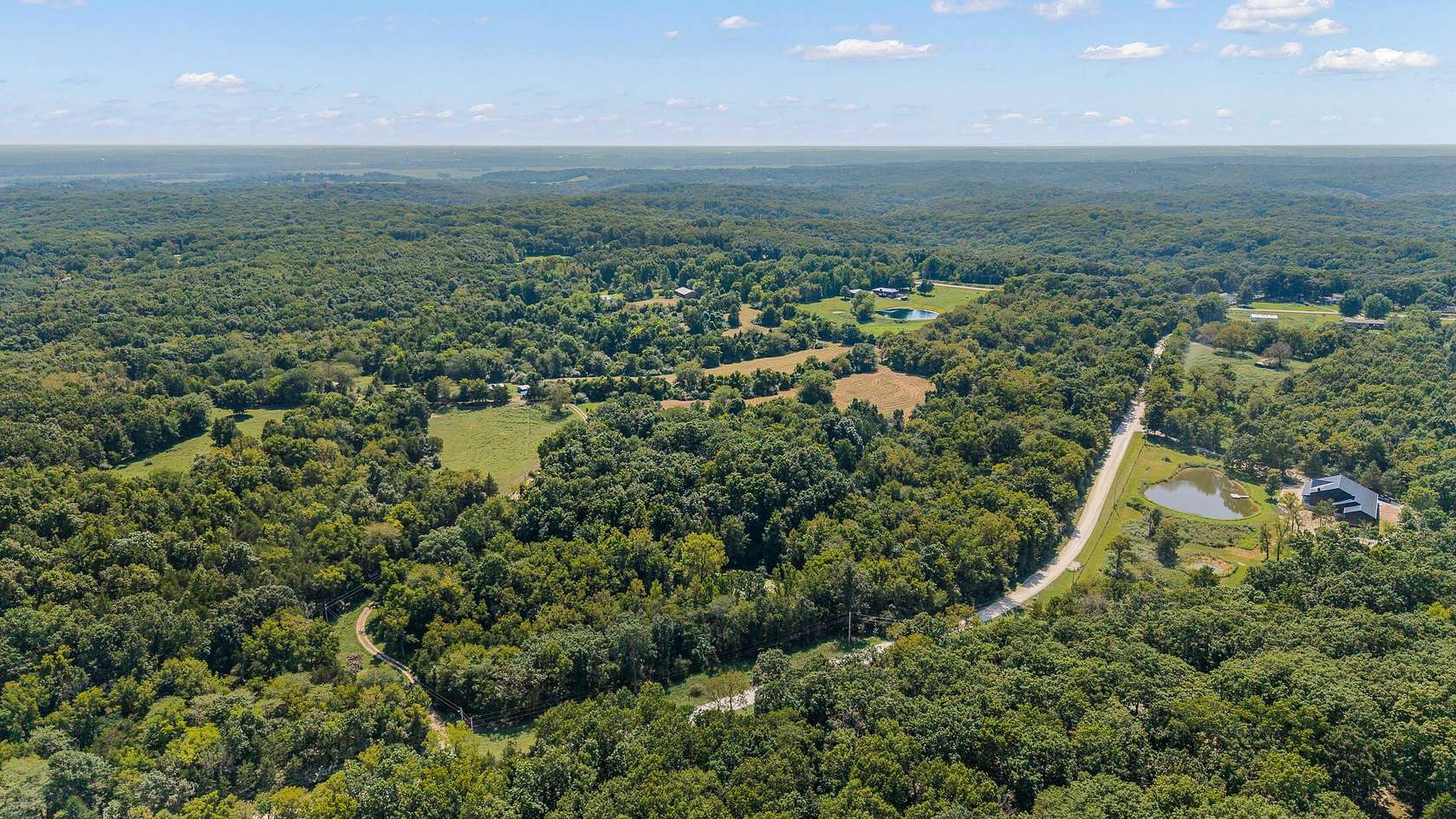 5.27 Acres of Residential Land for Auction in Holts Summit, Missouri