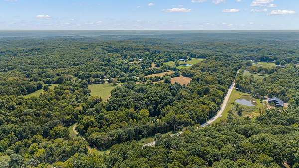 5.27 Acres of Residential Land for Auction in Holts Summit, Missouri
