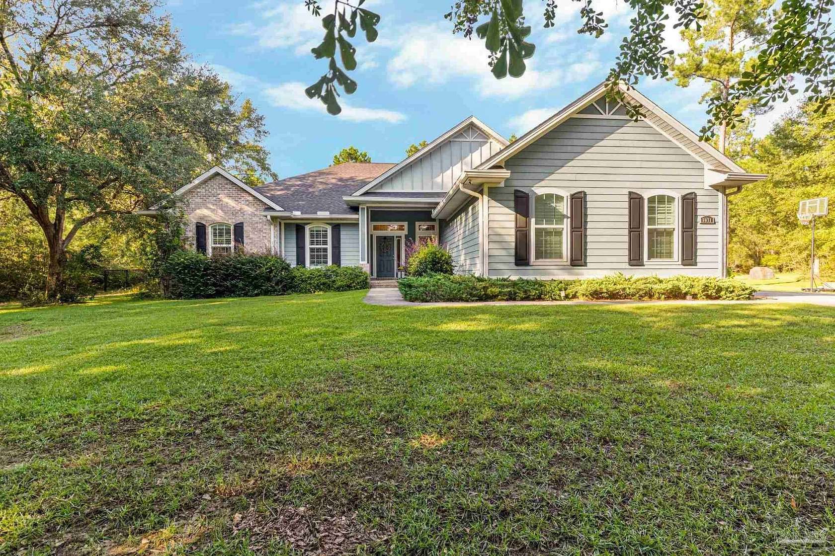4 Acres of Land with Home for Sale in Pace, Florida