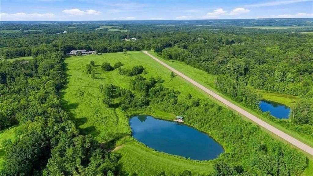 84.4 Acres of Recreational Land with Home for Sale in Platte City, Missouri