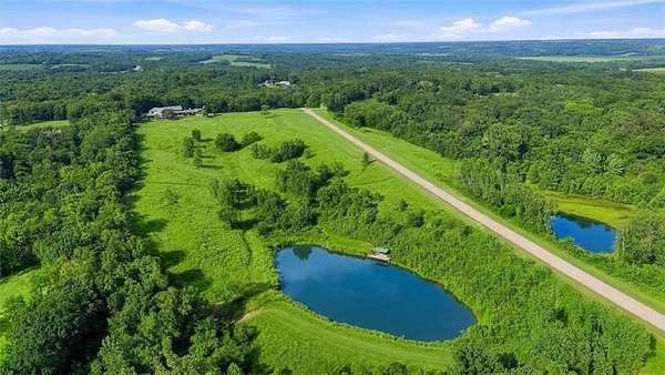 84.4 Acres of Recreational Land with Home for Sale in Platte City, Missouri