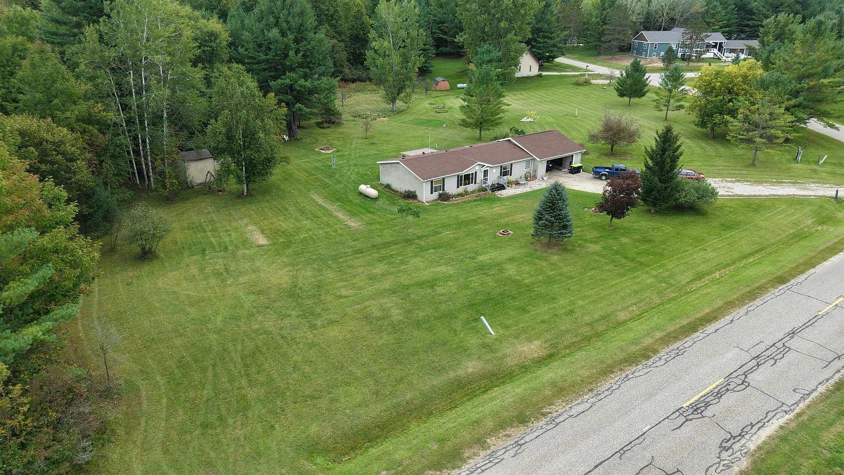 2 Acres of Land with Home for Sale in Gladwin, Michigan