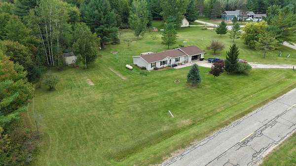 2 Acres of Land with Home for Sale in Gladwin, Michigan
