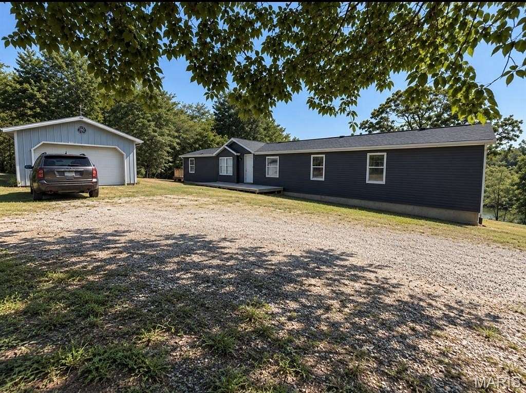 4.76 Acres of Land with Home for Sale in Dittmer, Missouri