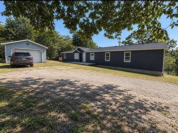 4.76 Acres of Land with Home for Sale in Dittmer, Missouri