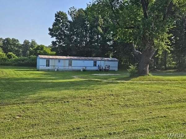 6 Acres of Land with Home for Sale in Pomona, Missouri