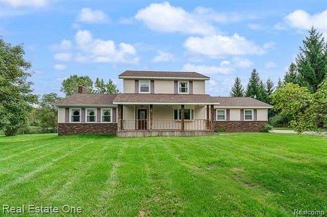 10.2 Acres of Land with Home for Sale in Fenton, Michigan