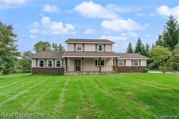 10.2 Acres of Land with Home for Sale in Fenton, Michigan