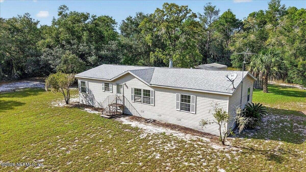 9.1 Acres of Land with Home for Sale in Pomona Park, Florida