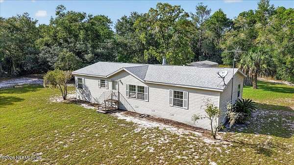 9.1 Acres of Land with Home for Sale in Pomona Park, Florida
