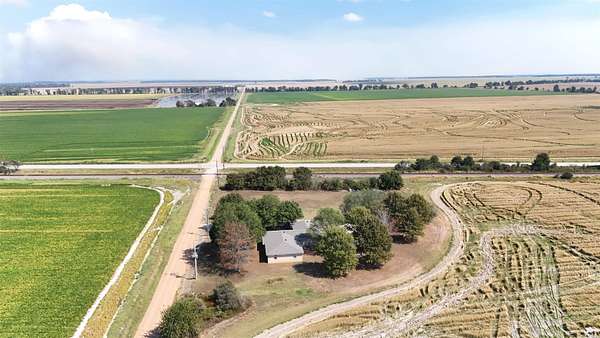 2 Acres of Land with Home for Sale in Hickory Ridge, Arkansas