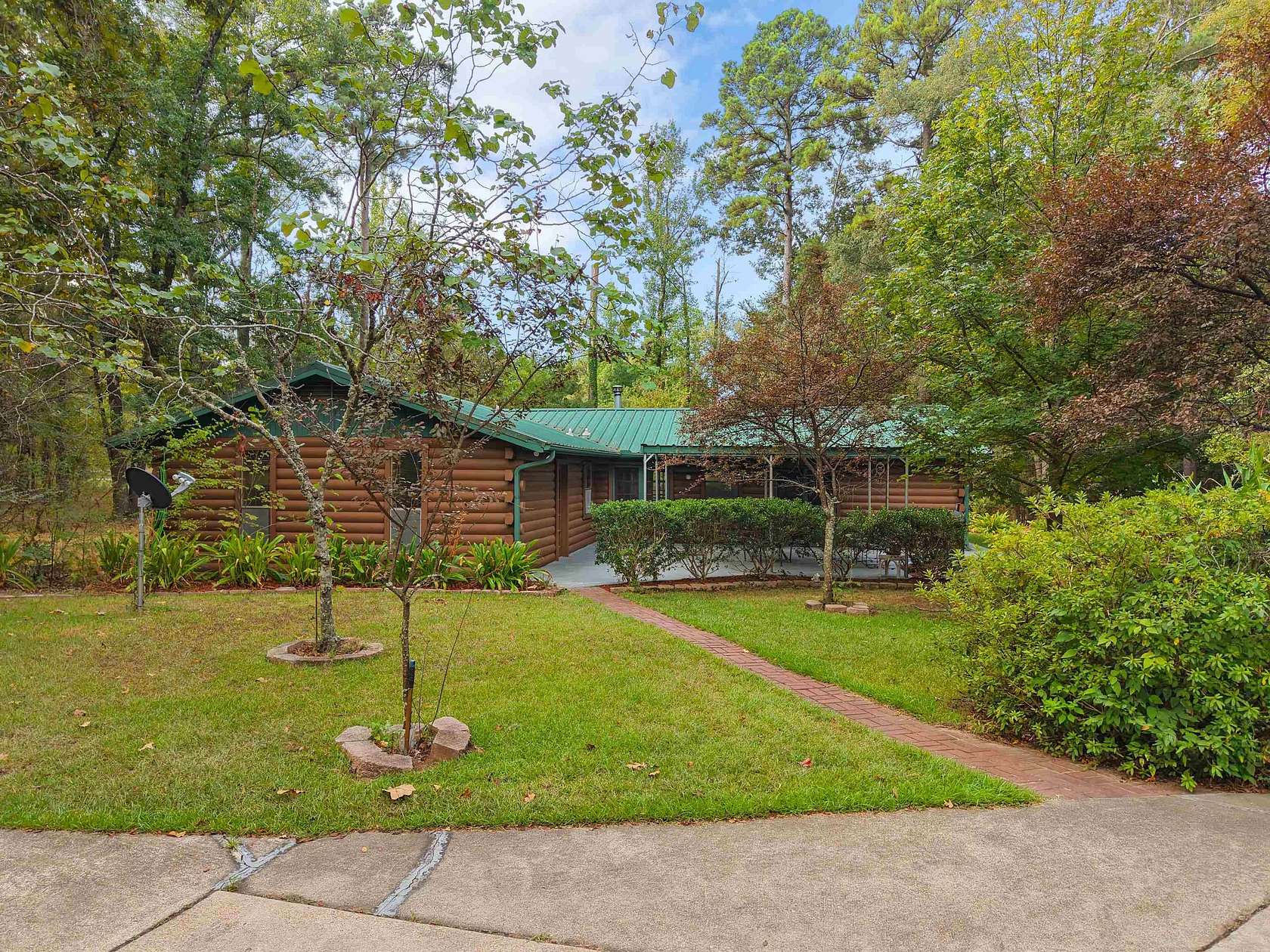 11.5 Acres of Recreational Land with Home for Sale in Hughes Springs, Texas