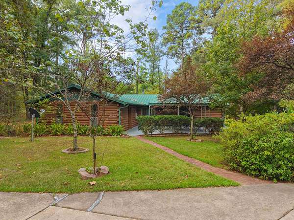 11.5 Acres of Recreational Land with Home for Sale in Hughes Springs, Texas
