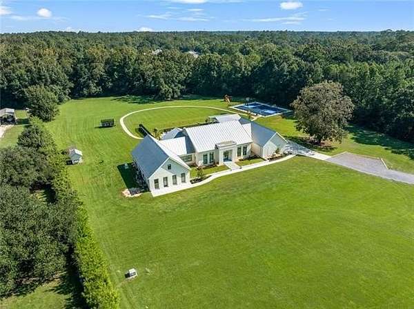 6.1 Acres of Land with Home for Sale in Madisonville, Louisiana