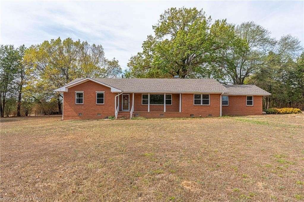 9.22 Acres of Land with Home for Sale in Booneville, Arkansas