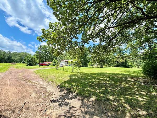2.59 Acres of Land with Home for Sale in Gilmer, Texas
